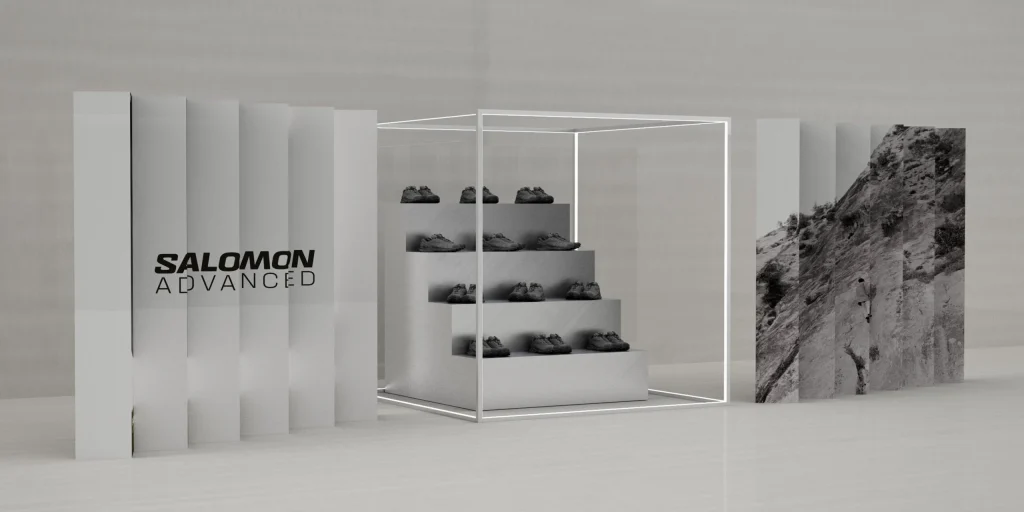 Render dell'allestimento Salomon con espositore a gradoni e scarpe in mostra