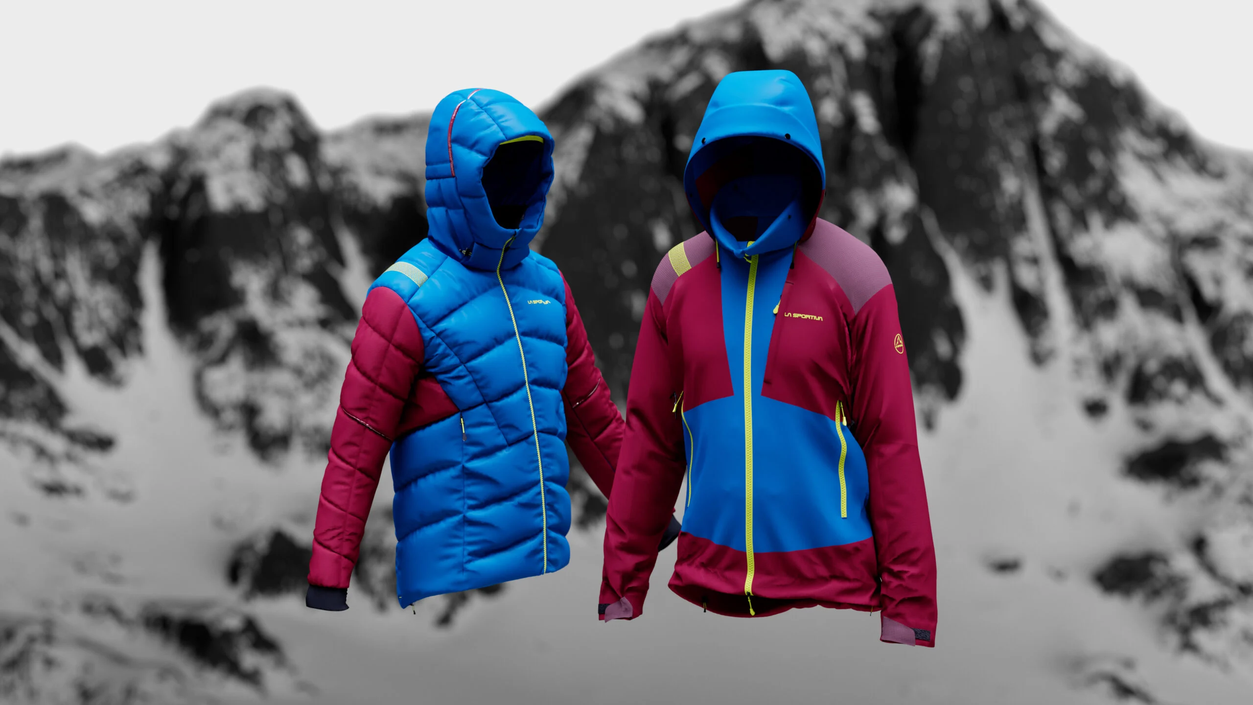 I due piumini Alpine Tech davanti a una parete di montagna innevata